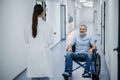 Disabled man in a wheelchair in a rehabilitation center Royalty Free Stock Photo