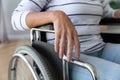 Disabled paraplegic handicapped old woman sit on wheelchair, close up