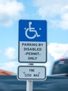 Disabled Parking Permit Sign $250 Fine on Blue Sky in the State of Florida Royalty Free Stock Photo