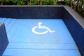Disabled parking sign on slope pathway