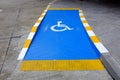 Disabled parking sign on slope pathway