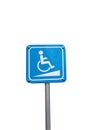 Disabled parking space and wheelchair way sign and symbols on a pole on white background Royalty Free Stock Photo