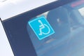 Disabled parking sticker tag on car Royalty Free Stock Photo