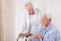 Disabled patient with walking zimmer