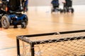 Disabled people on an electric wheelchair playing sports, powerchair hockey. IWAS - International wheelchair and amputee Royalty Free Stock Photo