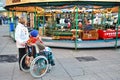 Disabled person in Christmas market