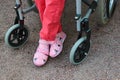 disabled person with disorders of the musculoskeletal system in a wheelchair on a walk