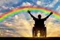 Disabled person with a nurse, happy rainbow