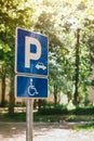 Disabled person parking spot sign, reserved lot space Royalty Free Stock Photo