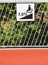 Disabled ramp sign on a fence