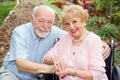 Disabled Senior Couple Outdoors Royalty Free Stock Photo