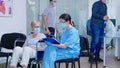 Disabled senior woman talking with nurse Royalty Free Stock Photo