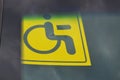 Disabled sign on the windshield of the car Royalty Free Stock Photo