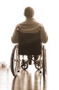 Disabled sitting in a wheelchair in the room Royalty Free Stock Photo