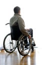 Disabled sitting in a wheelchair in the room near the window Royalty Free Stock Photo