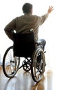 Disabled sitting in a wheelchair in the room near the window Royalty Free Stock Photo
