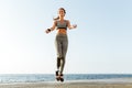 Disabled sports woman jumping with skipping rope Royalty Free Stock Photo