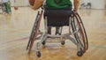 Disabled sportsmen plays wheelchair basketball Royalty Free Stock Photo