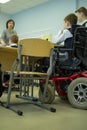 A disabled student in a wheelchair in primary school