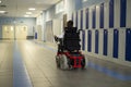 A disabled student in a wheelchair in primary school