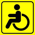 Disabled. Warning sign. Man in wheelchair. Black on yellow. Vector