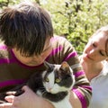 Disabled woman cuddles a cat