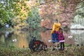 Disabled woman without legs with her daughter.