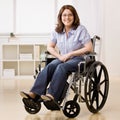 Disabled woman sitting in laptop