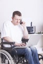 Disabled young man at the office Royalty Free Stock Photo