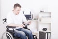 Disabled young man at the office Royalty Free Stock Photo