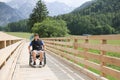 Disabled young man on a wheelchair