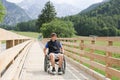 Disabled young man on a wheelchair