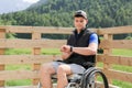 Disabled young man on a wheelchair