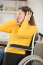 disabled young woman enjoys music Royalty Free Stock Photo