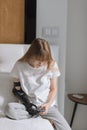 Disabled young woman with prosthetic arm using her smartphone Royalty Free Stock Photo