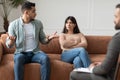 Couple talking at therapy session with male therapist Royalty Free Stock Photo