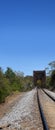 Disappearing Railroad Tracks into Bridge Royalty Free Stock Photo