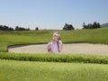 Disappointed Golfer In Sand Trap Royalty Free Stock Photo