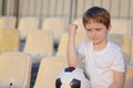 Disappointed little football fan