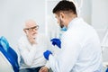 Disappointed man having dental session