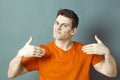 Disappointed man showing himself with hands for low self-esteem Royalty Free Stock Photo