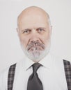 Disappointed senior man on white background Royalty Free Stock Photo