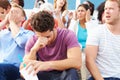 Disappointed Spectators At Outdoor Sports Event