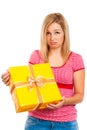 Disappointed woman with gift