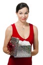 Disappointed woman holding a gift