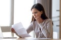 Disappointed woman read bad news in received letter Royalty Free Stock Photo