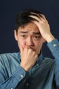 Disappointed young Asian man Royalty Free Stock Photo