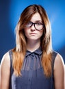 Disappointed young woman with nerd glasses, confused girl Royalty Free Stock Photo