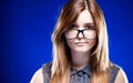 Disappointed young woman with nerd glasses, strict girl Royalty Free Stock Photo