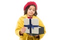 Disappointing purchase. Child stylish hold open gift box. Girl cute little lady coat and beret throws out gift. Spring Royalty Free Stock Photo